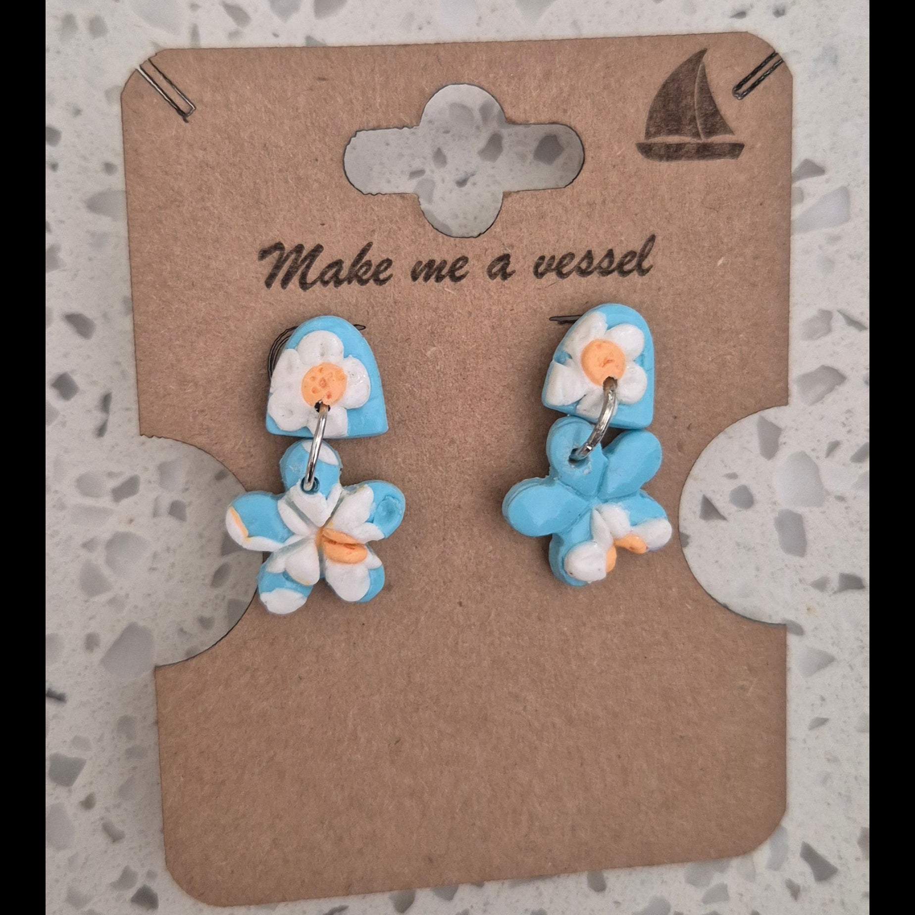 Baby blue flowers with white and yellow