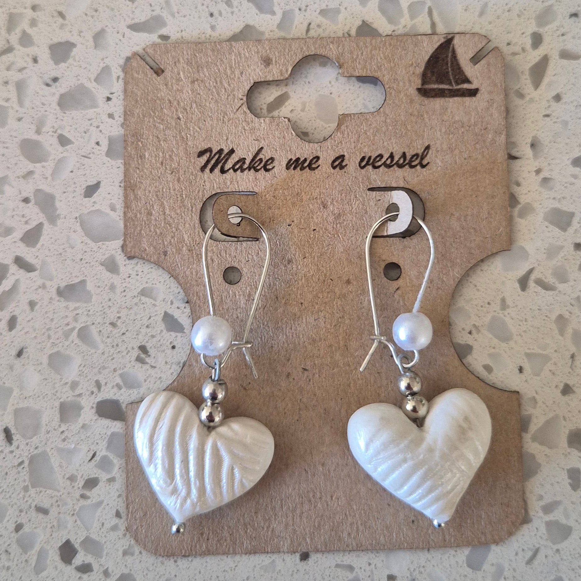 Wedding range hanging hearts with silver hooks